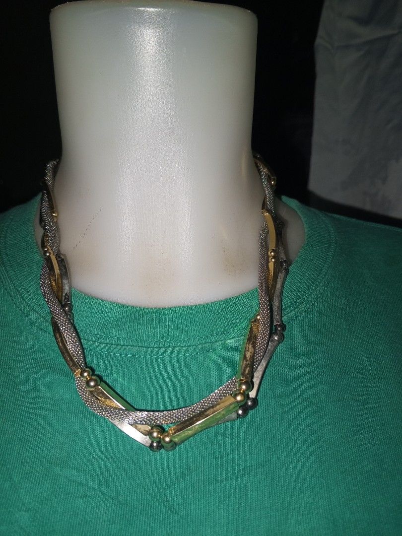 Two-tone gold and silver multi-strand statement necklace (Category: Necklaces) located in Magalang. Submitted by zeiansoria64090 (Listing ID 1464980600, Image 1). Description: - Mixed gold and silver tones - Multi-strand layered design - Features mesh chains, metal bar accents, and small spherical beads - Adjustable chain closure with a secure lobster clasp - Clean and ready to wear - Elevates both casual and formal outfits.