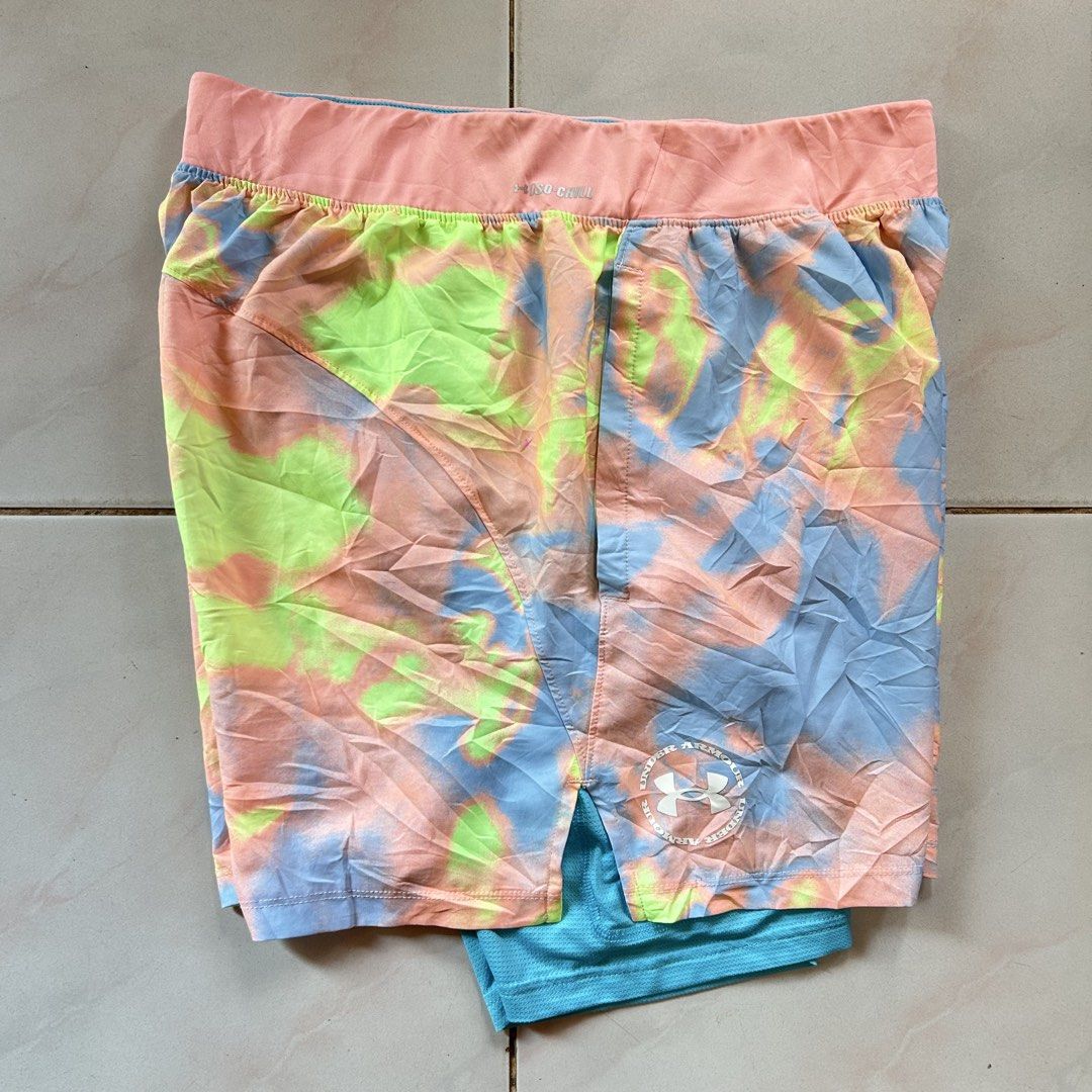 Under Armour Iso-Chill short 🔥 (Category: Shorts) located in Jinoba-an. Submitted by eegiboy (Listing ID 1465007173, Image 3). Description: - Brand: Under Armour - Size: Large - Design: Bright pink and blue tie-dye outer shell with built-in turquoise compression shorts - Technology: Iso-Chill waistband to disperse body heat and keep you cool - Fit: Fitted design with a lightweight feel - Details: White UA logo near the hem - Condition: Great for