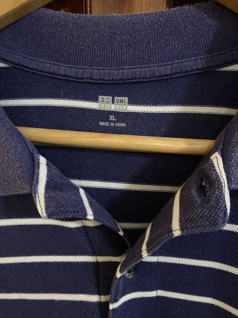 Uniqlo - Dark Blue Striped Polo (Category: Tshirts & Polo Shirts ) located in Manila. Submitted by miggiescorner (Listing ID 1464985042, Image 2). Description: -Size extra large -Never worn -No defects or stains -Gcash payment only -Shipping is included Please message for inquiries!.