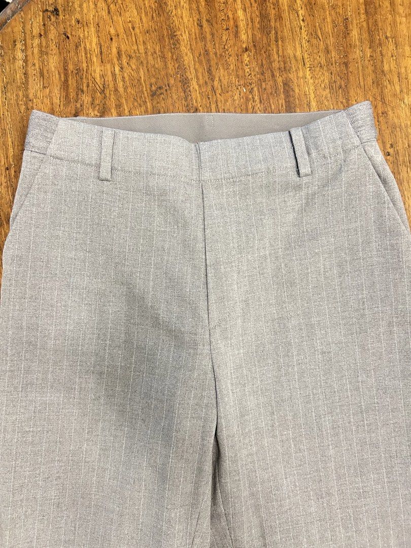 Uniqlo Ankle Pants (Category: Other Bottoms) located in Antipolo. Submitted by tshopph (Listing ID 1465043326, Image 2). Description: ✨ Super comfortable fabric with a clean, tailored pinstripe look ✨ Includes an elastic back waistband for a flexible fit and belt loops for easy styling ✨ Functional side pockets and back welt pockets ✨ Perfect for office workwear, smart-casual outfits, or everyday casual looks ✨ Color/Pattern: Grey with white pins