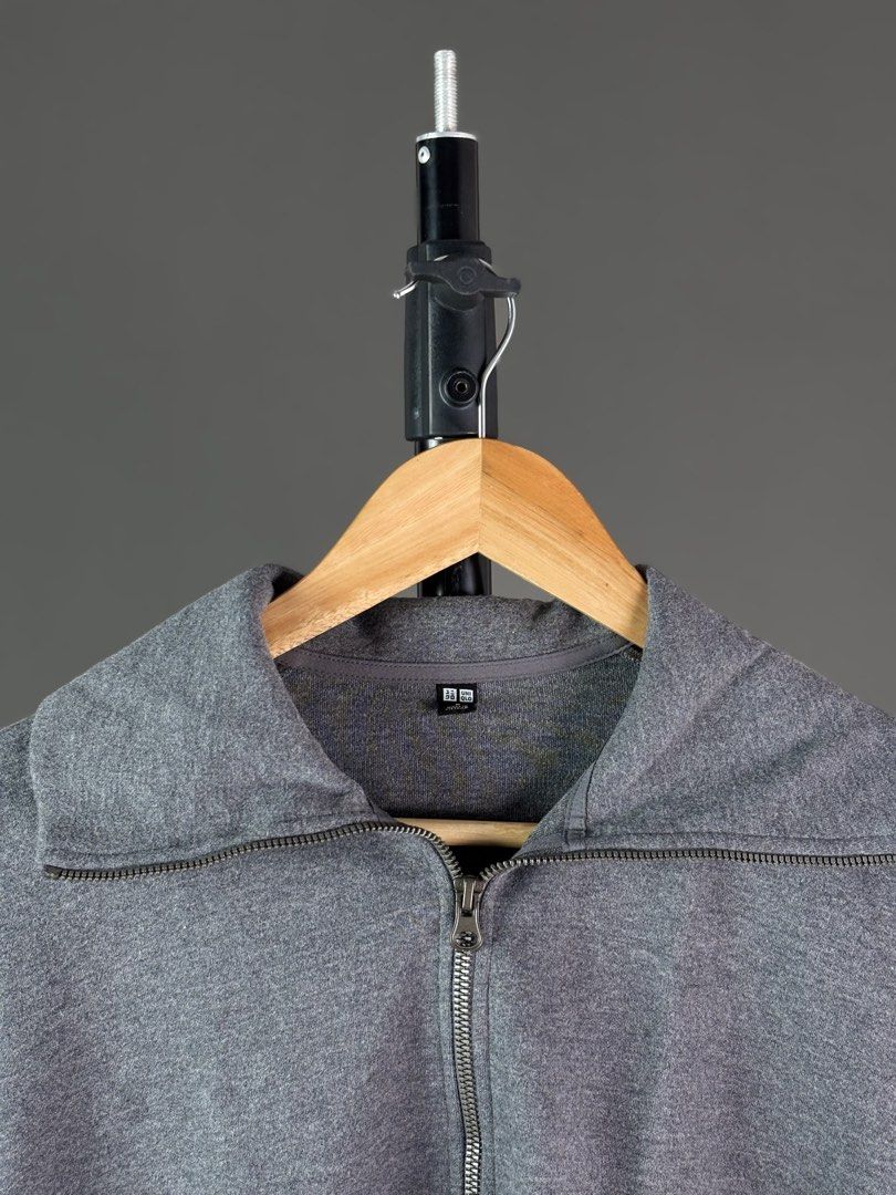 Uniqlo Grey Half Zip Sweatshirt (Category: Coats, Jackets and Outerwear) located in Malilipot. Submitted by brevsthrift (Listing ID 1465127275, Image 2). Description: - Brand: Uniqlo - Color: Grey - Style: Half-zip sweatshirt with a trendy big collar and metal zipper hardware - Material: 65% cotton, 35% polyester blend - Measurements: 21" (width) x 21" (length) - Features: Long sleeves and ribbed cuffs for a snug fit - Condition: Excellent .