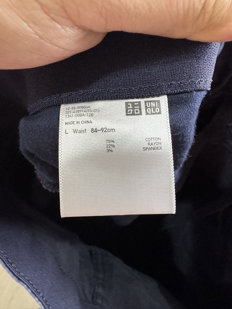 Uniqlo Navy Blue Stretch Pants Size L (Category: Trousers) located in Quezon City. Submitted by turak2020plus1 (Listing ID 1464971580, Image 3). Description: Brand: Uniqlo Measurements and Details: - Color: Navy Blue - Size: L (Fits waist 84 to 92 cm) - Outseam: 38in - Material: Comfortable cotton, rayon, and spandex blend for stretch and flexibility - Style: Classic five-pocket design with zip fly and button closure - Versatile: Easy to pair for
