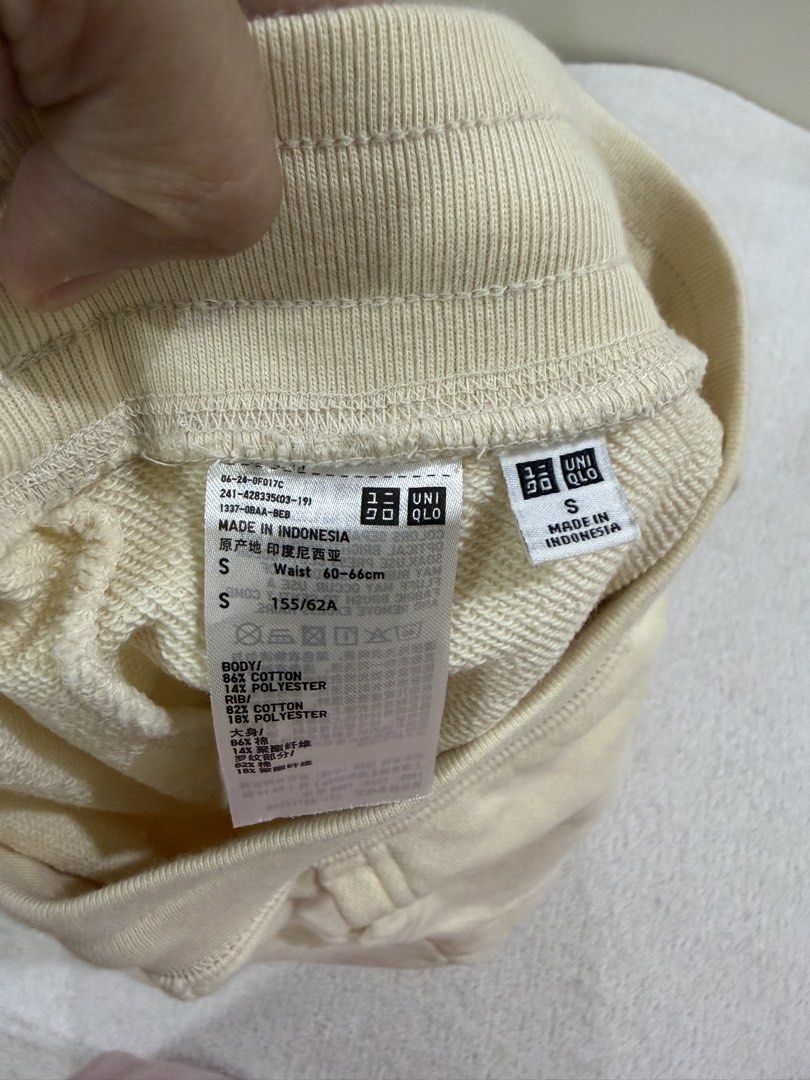 Uniqlo Sweatpants Joggers Size S (Category: Other Bottoms) located in Subic. Submitted by kittysclosetsale (Listing ID 1465016489, Image 3). Description: - Brand: Uniqlo - Item: Cream Joggers / Sweatpants - Size: S (Waist: 60-66cm, Height: 155/62A) - Material: Body: 86% Cotton, 14% Polyester | Ribbing: 82% Cotton, 18% Polyester - Made in: Indonesia - Features: Drawstring waistband with metal tips, two side pockets, and ribbed ankle cuffs.