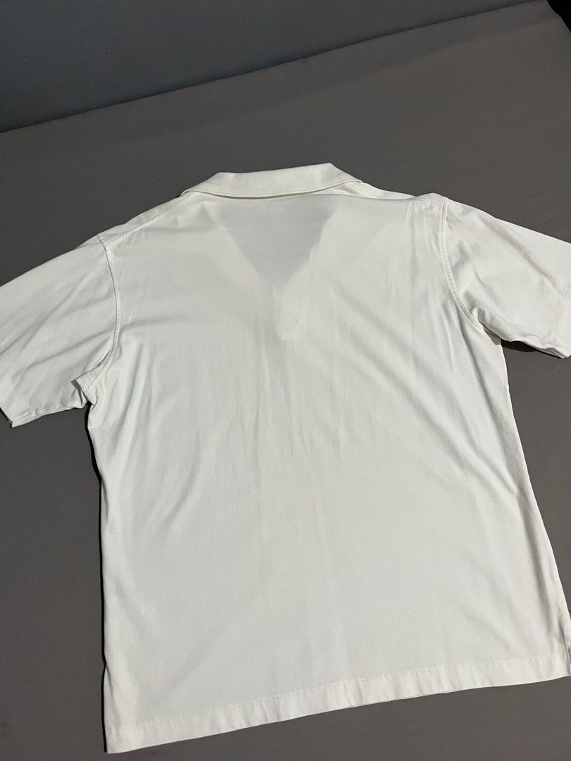 Uniqlo Airism Cotton Short Sleeve Polo Shirt (White) (Category: Tshirts & Polo Shirts ) located in Taguig. Submitted by csthejustin (Listing ID 1465158111, Image 2). Description: - Size: Small - Features: Uniqlo Dry technology and Cool to touch fabric - Versatility: Perfect for casual days or office wear, easily matched with jeans, shorts, or trousers *Also available in Olive Green. Check out my profile for other Uniqlo pieces. .