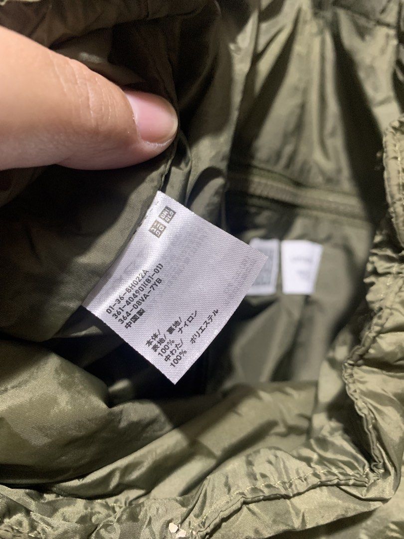 Unqlo Nylon bag pack (Category: Backpacks) located in Itogon. Submitted by kitkayt (Listing ID 1465066212, Image 3). Description: - Brand/Model: Uniqlo U Nylon Backpack - Color: Olive Green / Sage - Material: 100% Nylon body/lining with polyester padding - Closure: Convenient drawstring top with adjustable straps - Features: Includes interior zippered pocket for small essentials - Condition: Excellent pre-owned condition.