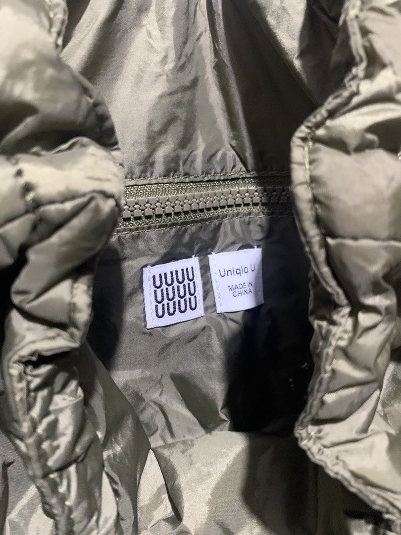 Unqlo Nylon bag pack (Category: Backpacks) located in Itogon. Submitted by kitkayt (Listing ID 1465066212, Image 2). Description: - Brand/Model: Uniqlo U Nylon Backpack - Color: Olive Green / Sage - Material: 100% Nylon body/lining with polyester padding - Closure: Convenient drawstring top with adjustable straps - Features: Includes interior zippered pocket for small essentials - Condition: Excellent pre-owned condition.