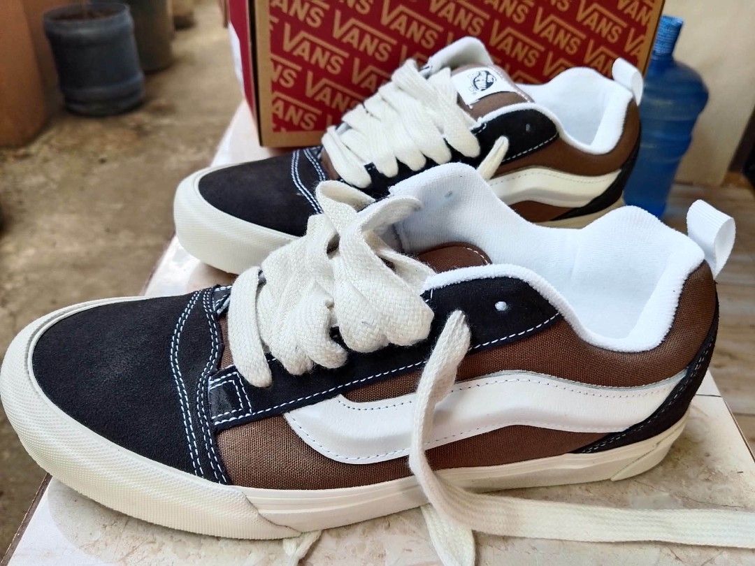 Vans Knu Skool Light Brown Dark Brown (Category: Sneakers) located in Bacolod City. Submitted by WLOnlineShop (Listing ID 1464973730, Image 1). Description: - Model: Vans Knu Skool retro chunky shoes - Colorway: Light brown and dark brown with white side stripe - Design: Classic puffy tongue and thick laces style - Material: Sturdy suede and canvas upper with signature waffle rubber outsole - Condition: Brand new, fresh out of the box with origin