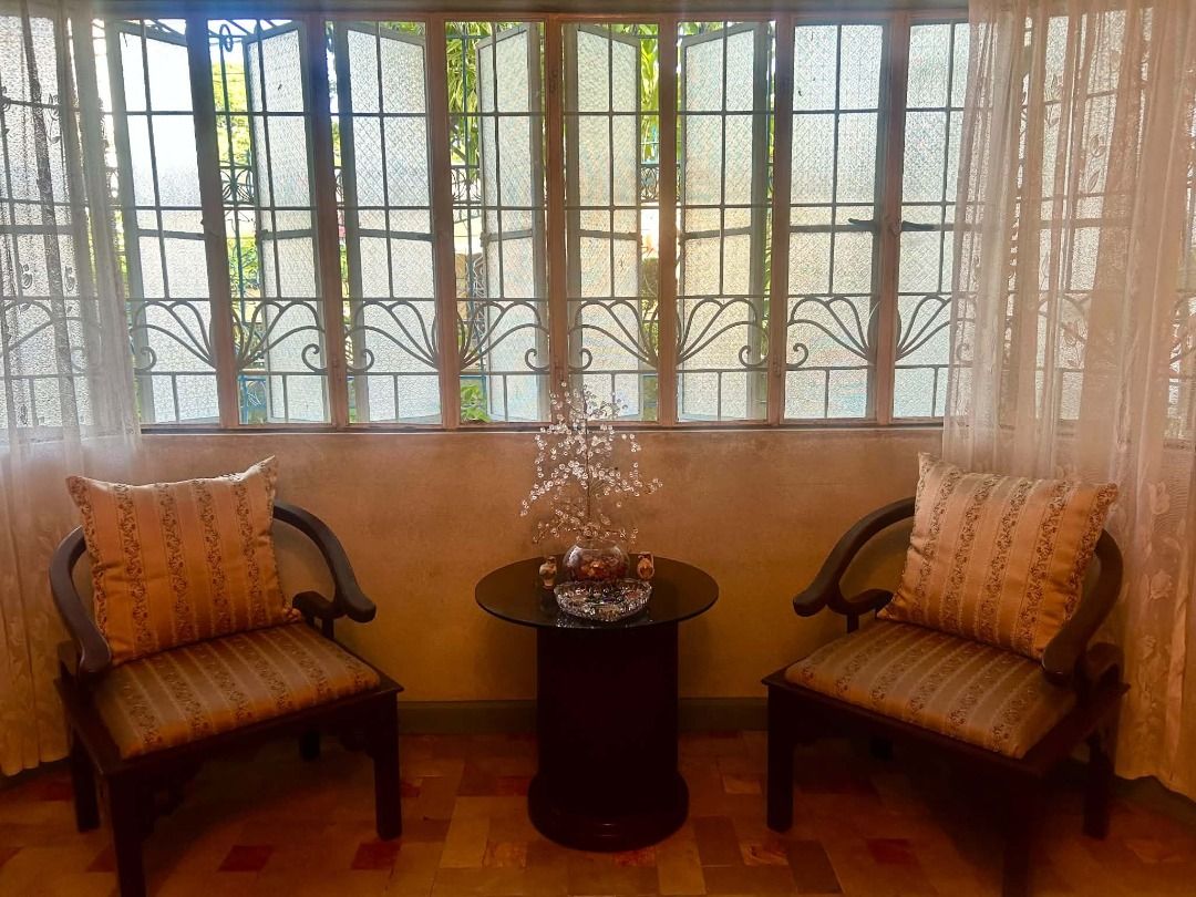 Vintage 1990s Narra Coffee Table & Chairs Set - 3-Piece Set (Category: Other Home Furniture) located in Malabon City. Submitted by zorlone (Listing ID 1465054827, Image 1). Description: Elevate your living space with this beautiful, sturdy vintage coffee set, meticulously crafted from rich Narra wood in the 1990s. This classic piece of craftsmanship offers both timeless style and enduring durability. The Set Includes: Two Heavy Narra Armchairs: F