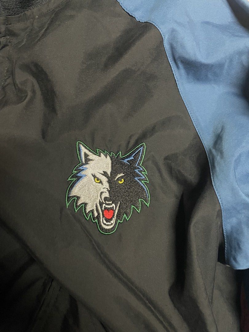 Vintage Adidas Minnesota Jacket (Category: Coats, Jackets and Outerwear) located in Manila. Submitted by 2002kid (Listing ID 1465069369, Image 3). Description: - Brand: Adidas - Team: Minnesota Timberwolves - Color: Black and blue - Size: Large - Details: Embroidered wolf logo on chest, large Minnesota Basketball lettering and wolf logo on back - Features: Full-zip front, high collar, ribbed cuffs and hem - Condition: Clean, graphics and embroide