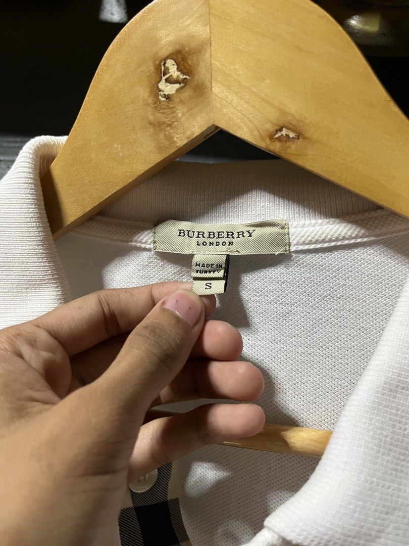 Vintage Burberry polo (Category: Tshirts & Polo Shirts ) located in San Jose. Submitted by thriftfindsarchive (Listing ID 1465101659, Image 3). Description: Size S Width 18 Length 27 Issue minimal pink ink not visible good condition 9/10 color rate Fave ✨.