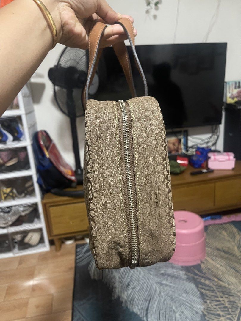 Vintage Coach Travel bag (Category: Purses & Pouches) located in Manila. Submitted by pray.loved.life (Listing ID 1465026183, Image 2). Description: -Coach Signature C BRWN Jacquard Canvas Leather Handle Travel Cosmetic Makeup Bag -Normal signs of usage only.