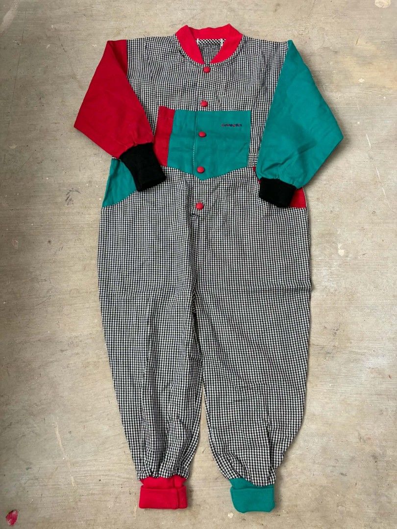 Vintage Gymboree (Category: Babies & Kids Fashion) located in Las Pinas. Submitted by pinkpototo36548 (Listing ID 1465070800, Image 1). Description: - Vintage Gymboree jumpsuit for little ones - Black and white houndstooth pattern with bold red and teal colorblock panels - Features red front buttons and an embroidered logo on the chest pocket - Stylish ribbed cuffs in black, red, and green at wrists and ankles - Rare and uniquely fun statement pi