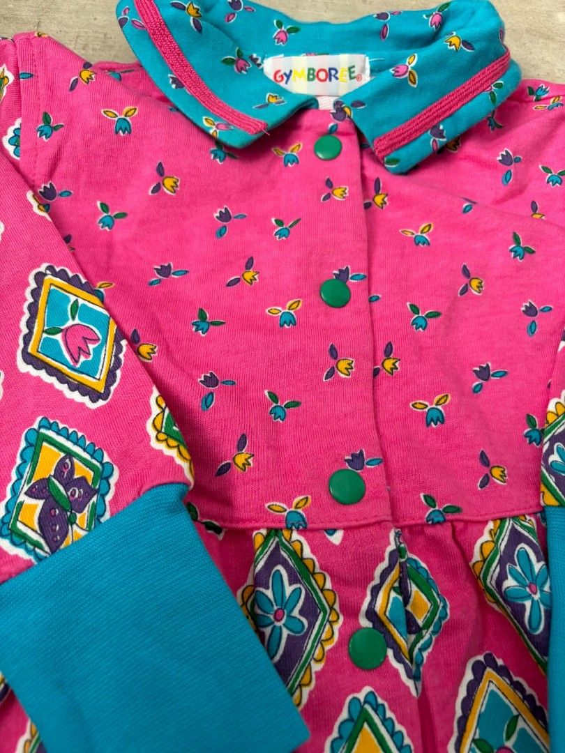Vintage Gymboree Floral Diamond Pattern (Category: Babies & Kids Fashion) located in Las Pinas. Submitted by pinkpototo36548 (Listing ID 1465072043, Image 3). Description: - Brand: Gymboree - Color/Pattern: Bright pink with colorful diamond patterns and floral prints - Details: Turquoise collar, green front button closure - Cuffs: Ribbed turquoise wrist cuffs and purple ankle cuffs - Style: Fun, vibrant retro toddler piece - Brandnew condition wi