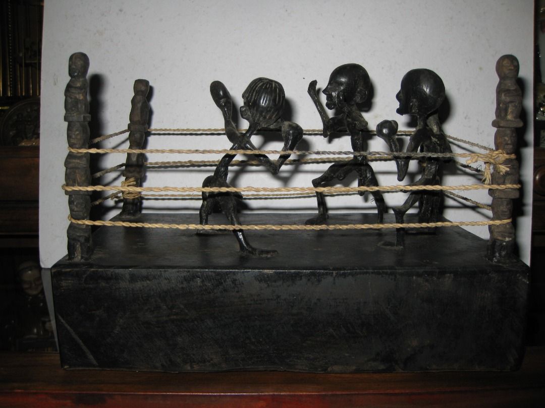 Vintage Hand Carved Native Boxing Ring Boxers & Referee (Category: Vintage Collectibles) located in Baguio. Submitted by mrbrunno (Listing ID 1464977528, Image 1). Description: Vintage Hand Carved Native Boxing Ring Boxers & Referee Ifugao Purchased over 20 years ago. Was carved in the 80's Could use cleaning. Could be re-stained if you want it to look new, this is exactly how it was when i purchased it, i prefer the older finish. Nice & very unu