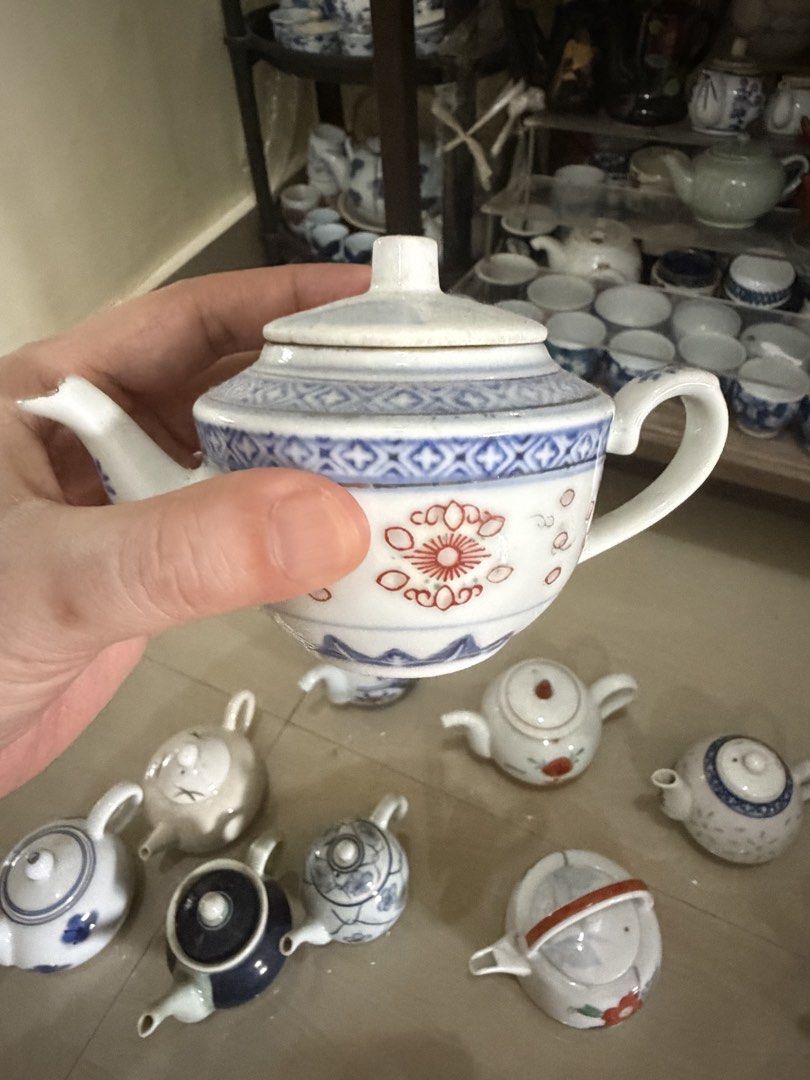 Vintage Mini Ceramic Teapot Collectible Assorted Designs (Category: Coffee & Tea Tableware) located in Manila. Submitted by ginatan197811 (Listing ID 1464980431, Image 1). Description: - Mini ceramic teapot collection with matching lids - Features hand-painted blue, white, and floral patterns - Perfect cute display pieces or miniature tea set collectibles - Great shelf decor for tea lovers - Multiple styles available.