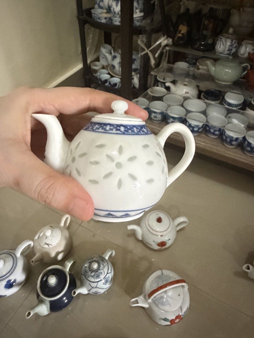 Vintage Mini Ceramic Teapot Collectible Assorted Designs (Category: Coffee & Tea Tableware) located in Manila. Submitted by ginatan197811 (Listing ID 1464980431, Image 3). Description: - Mini ceramic teapot collection with matching lids - Features hand-painted blue, white, and floral patterns - Perfect cute display pieces or miniature tea set collectibles - Great shelf decor for tea lovers - Multiple styles available.