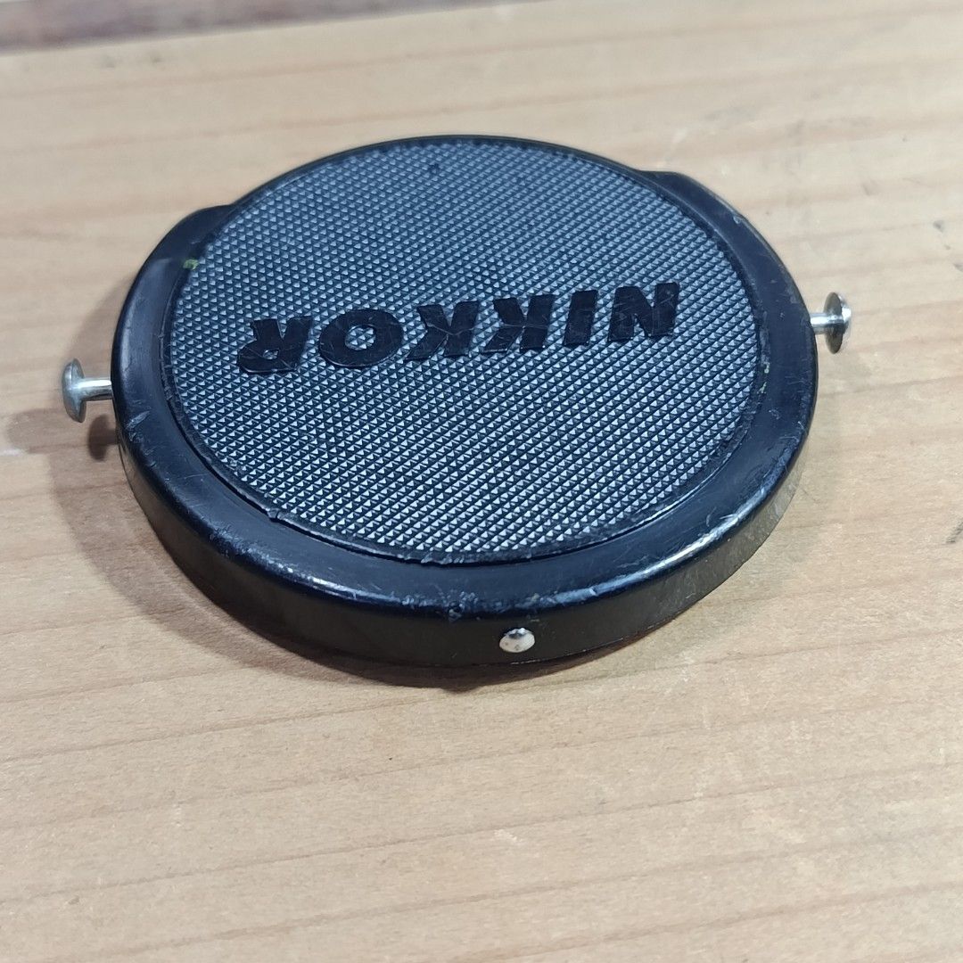 Vintage Nikon NIKKOR Cap (Category: Other Photography Accessories) located in Las Pinas. Submitted by 84vintage (Listing ID 1465008984, Image 1). Description: Metal Pinch Version (Aluminum) For your Period Correct Cap Obsession. For Vintage Nikon lens Nikkor Lens..