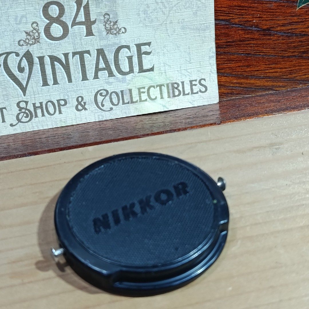Vintage Nikon NIKKOR Cap (Category: Other Photography Accessories) located in Las Pinas. Submitted by 84vintage (Listing ID 1465008984, Image 2). Description: Metal Pinch Version (Aluminum) For your Period Correct Cap Obsession. For Vintage Nikon lens Nikkor Lens..