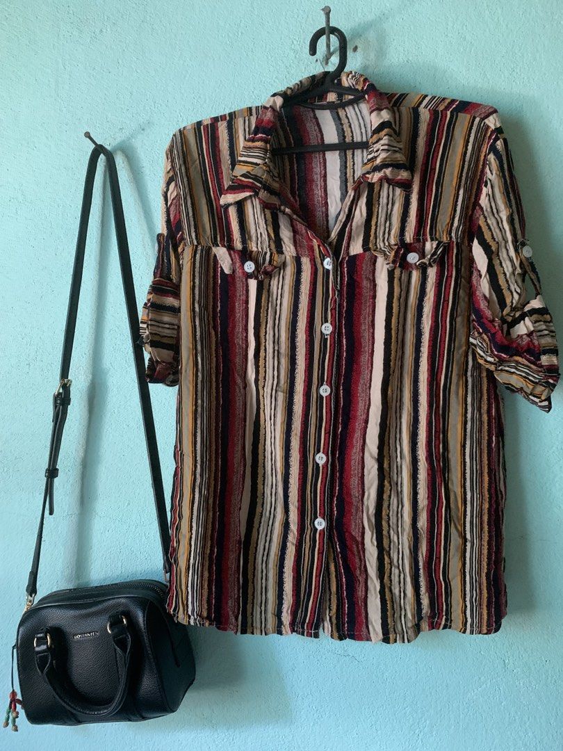 3 for 100 Vintage Style Button Down Shirts Bundle or Individual (Category: Blouses) located in Daraga. Submitted by ryrilim (Listing ID 1465013684, Image 2). Description: - Set of 3 vintage-style short sleeve button-downs - Prints: Colorful stripe, black & blue stripe, and black & white geometric abstract - Features: Front button closures, classic shirt collars, and convenient chest pockets - Fabric: Lightweight and breathable, ideal for casual e