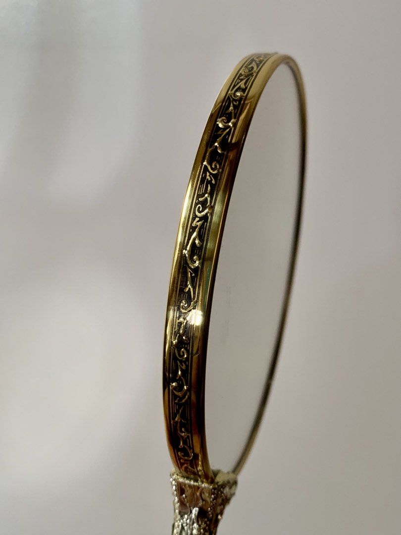 Vintage Style Handheld Mirror (Category: Mirrors) located in Tandag. Submitted by jeason_22 (Listing ID 1465013533, Image 3). Description: • Vintage style mirror in ornate design • Plastic handle • Makeup mirror with magnification • Good condition/ no flaws .