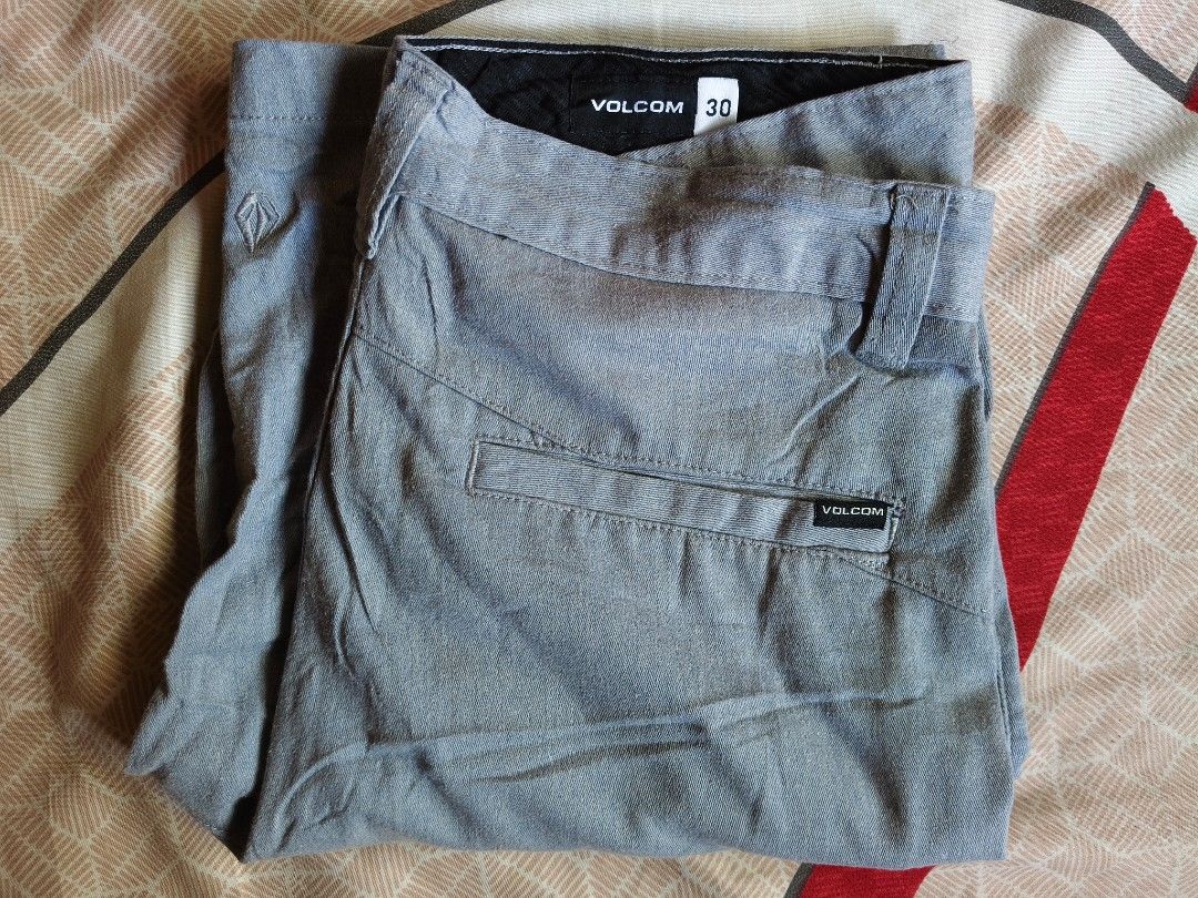 Volcom Men's Grey Casual Shorts Size 30 (Category: Shorts) located in Baguio. Submitted by thriftjc (Listing ID 1464973448, Image 1). Description: - Brand: Volcom - Size: 30 - Color: Grey - Closure: Standard button closure with zip fly - Features: Belt loops and side pockets with Volcom logo tags - Condition: Clean fabric with no major wear - Style: Great everyday casual pair.