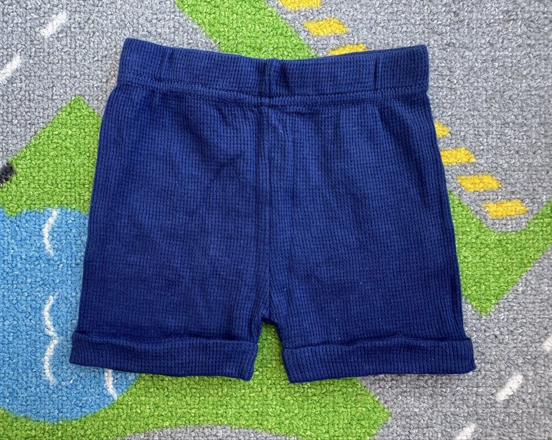 Waffle Knit Cotton Shorts (Category: Babies & Kids Fashion) located in Rizal. Submitted by preloovved (Listing ID 1465065796, Image 1). Description: Super comfy blue cotton waffle knit shorts for kids. Features an easy elastic waistband, rolled cuffs, and soft ribbed material—perfect for play or lounging. Navy blue waffle knit shorts with elastic waistband and cuffed hem. Casual wear. Preloved, 3mos Meet-up only in GB1 San Mateo, Rizal Shipping f