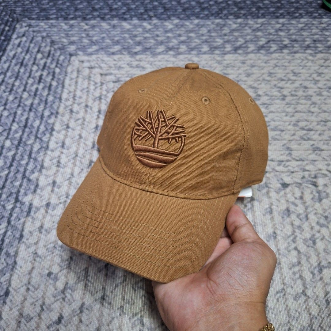 Wallnut Brown big logo unstructured bucklestrap dad cap/hat by Timberland (Category: Caps & Hats) located in Balagtas. Submitted by capncaps09 (Listing ID 1464999918, Image 1). Description: Wallnut Brown big logo unstructured bucklestrap dad cap/hat by Timberland organic cotton brand new legit 100% 550.