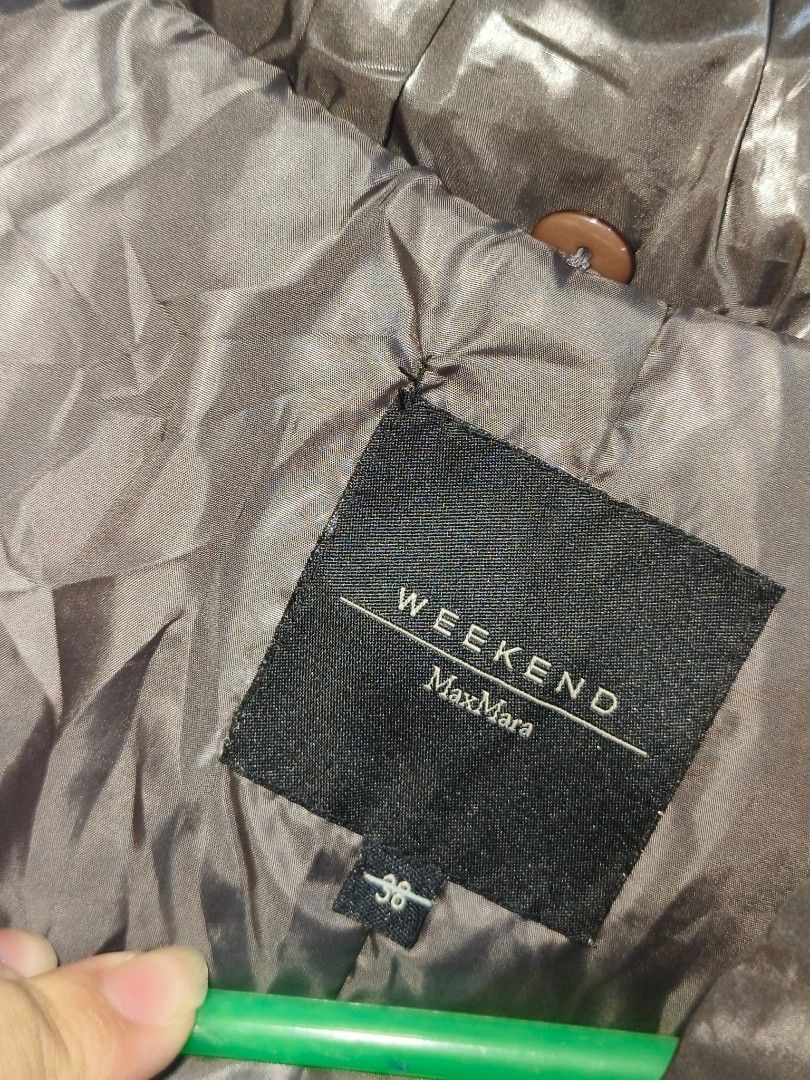 Weekend MaxMara Heavy Padded Jacket (Category: Coats, Jackets and Outerwear) located in Baguio. Submitted by luxeloomarchive (Listing ID 1465073088, Image 3). Description: Weekend MaxMara lightweight puff Jacket ​Stay warm in style with this chic, high-sheen Weekend MaxMara padded jacket. Featuring heavy insulation, a plush shawl collar, feminine ruffled trim at the cuffs and hem, and a cinch-waist belt with a metallic buckle lightweight to wear,