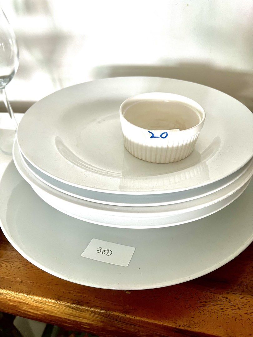 White Ceramic Dinner Plates and Ramekin Bowl (Category: Dinnerware & Cutlery) located in Manila. Submitted by noblecrystal_ff870c (Listing ID 1464979542, Image 1). Description: - Minimalist solid white glaze with a smooth surface finish - Includes matching dinner plates and a small fluted ramekin bowl - Sturdy and durable build for everyday use - Neutral design blends easily with your current kitchenware - Easy to wash and stackable for space-sav
