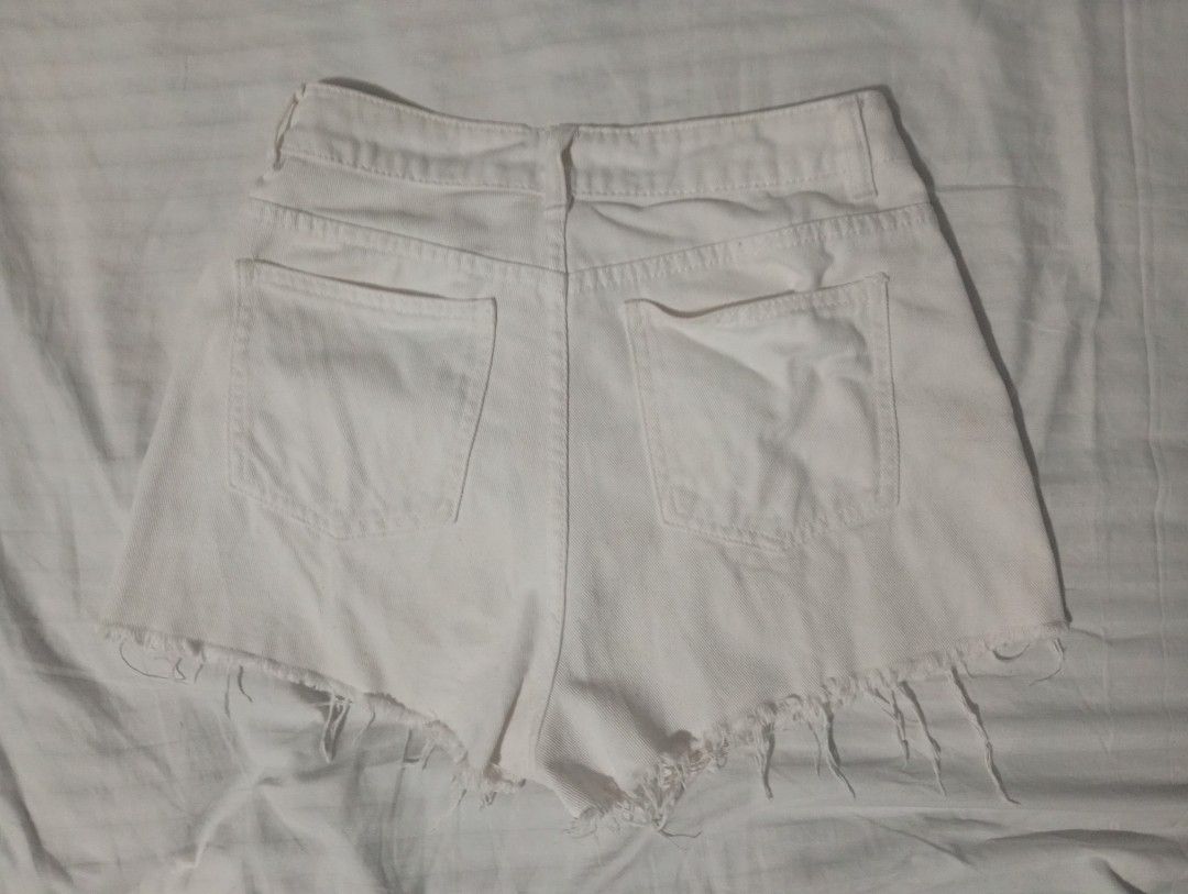 White Denim Shorts (Category: Shorts) located in Santa Maria. Submitted by itsmacmacky (Listing ID 1465155742, Image 2). Description: White Denim Shorts Brand: Cotton On / Made for a Restless Generation Size: 8 on tag (Small - 26/27 waist) Style: High waist, front zip + button, frayed / raw hem Color: White / Off white Condition: Good Waist: 26-27" Length: ~12".