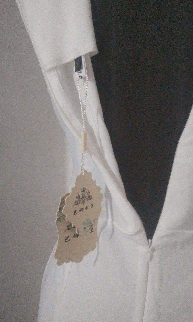 White dress (Category: Dresses) located in San Fernando. Submitted by kitkat.astina (Listing ID 1464972441, Image 3). Description: new white tape measurement front: bust: 16inches waist: 14inches length: 40inches perfect for civil weddings or formal occasion.