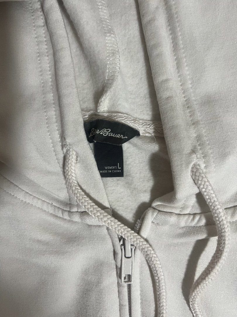 White Zip-Up Hoodie (Category: Coats, Jackets and Outerwear) located in Quezon City. Submitted by ficarts (Listing ID 1465001268, Image 2). Description: white zip-up hoodie white cream color rfs:decluttering .