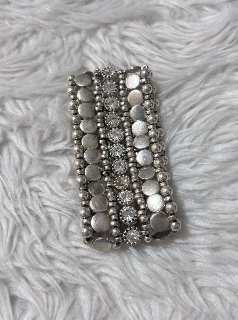 Wide silver-tone stretch cuff bracelet (Category: Bracelets) located in Paranaque City. Submitted by dalle_closet (Listing ID 1465023214, Image 3). Description: missing po ng isang stone. see last pic.
