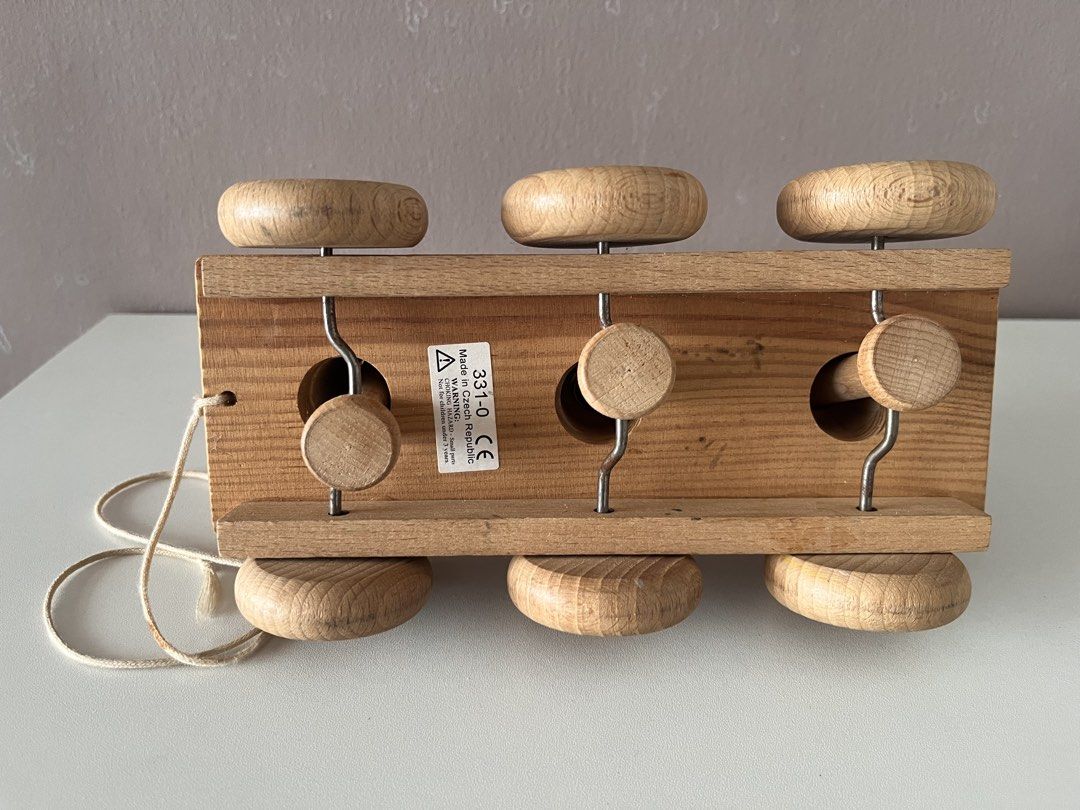 Wooden Duck Pull Toy Train with Pull String (Category: Kids Toys) located in Quezon City. Submitted by littleparties (Listing ID 1464983753, Image 3). Description: - Adorable wooden train pull toy carrying three ducks - Crafted in the Czech Republic from solid natural wood - Features painted black and white eyes and six smooth wooden wheels on metal axles - Comes with the original pull string attached - Minor wear on one duck beak, otherwise grea