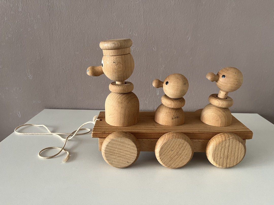 Wooden Duck Pull Toy Train with Pull String (Category: Kids Toys) located in Quezon City. Submitted by littleparties (Listing ID 1464983753, Image 2). Description: - Adorable wooden train pull toy carrying three ducks - Crafted in the Czech Republic from solid natural wood - Features painted black and white eyes and six smooth wooden wheels on metal axles - Comes with the original pull string attached - Minor wear on one duck beak, otherwise grea