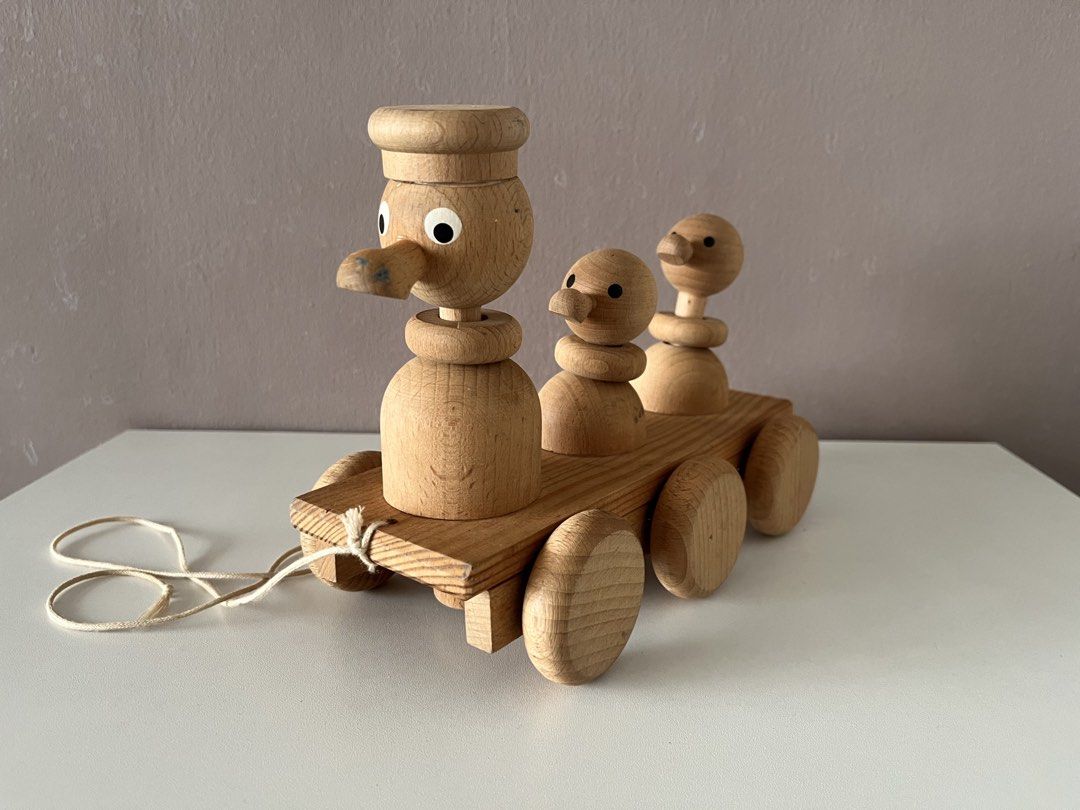 Wooden Duck Pull Toy Train with Pull String (Category: Kids Toys) located in Quezon City. Submitted by littleparties (Listing ID 1464983753, Image 1). Description: - Adorable wooden train pull toy carrying three ducks - Crafted in the Czech Republic from solid natural wood - Features painted black and white eyes and six smooth wooden wheels on metal axles - Comes with the original pull string attached - Minor wear on one duck beak, otherwise grea