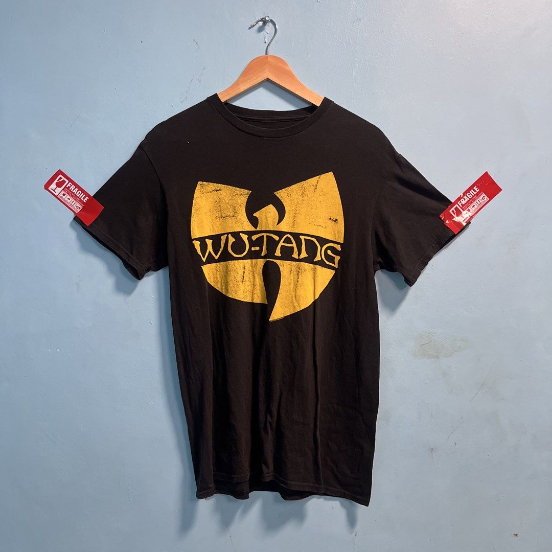 Wutang shirt (Category: Tshirts & Polo Shirts ) located in Santo Tomas. Submitted by niftynook_22 (Listing ID 1464987218, Image 1). Description: Excellent condition 9/10 color rate 19.5 (can stretch to 20.5 ) x 27.5 No issue .