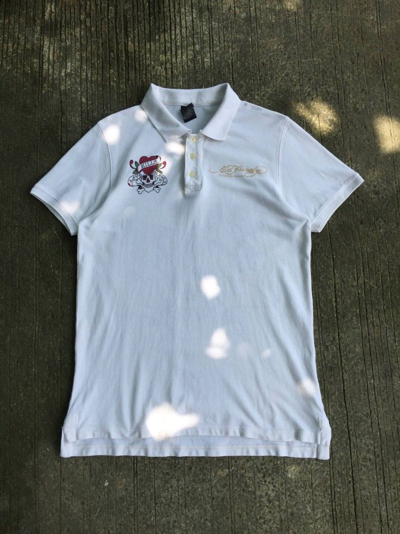 Y2k Christian Audiger Ed Hardy (Category: Everything Else Others) located in Calamba. Submitted by mysticcat-5ccee5 (Listing ID 1465052704, Image 2). Description: 📌Ed Hardy By Christian Audiger Polo Shirt Rhinestone Dimes 📏 Length:30.5 Back:32 Width:21 Good Condition 8/10 Cr Few missing stone 💸999 Free Shipping.