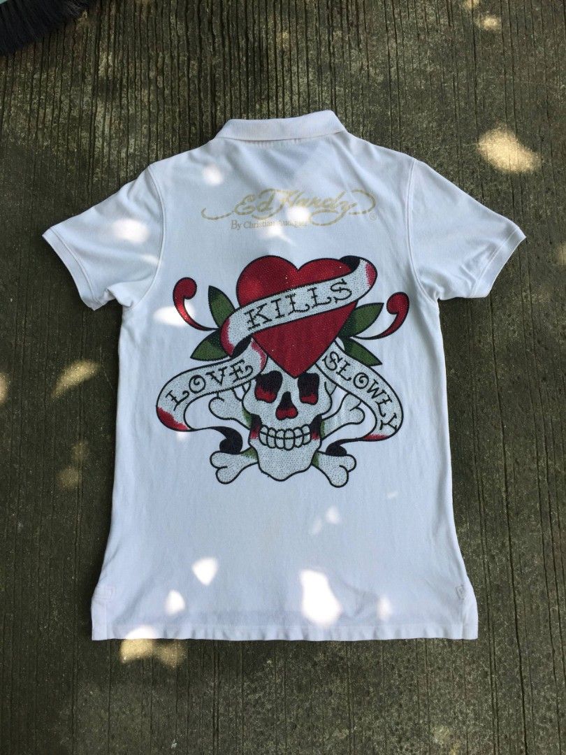 Y2k Christian Audiger Ed Hardy (Category: Everything Else Others) located in Calamba. Submitted by mysticcat-5ccee5 (Listing ID 1465052704, Image 1). Description: 📌Ed Hardy By Christian Audiger Polo Shirt Rhinestone Dimes 📏 Length:30.5 Back:32 Width:21 Good Condition 8/10 Cr Few missing stone 💸999 Free Shipping.