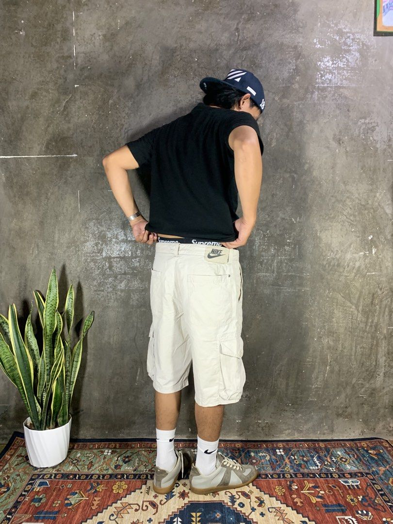 Y2K Nike Cargo Short Button-fly (Cream) (Category: Shorts) located in Aurora. Submitted by cpr_garments13 (Listing ID 1465116037, Image 3). Description: Models height 5’6 Large on tag Measurements •Waist:33-34 •Length:21 •Leg opening:11 Excellent condition -Need Wash.