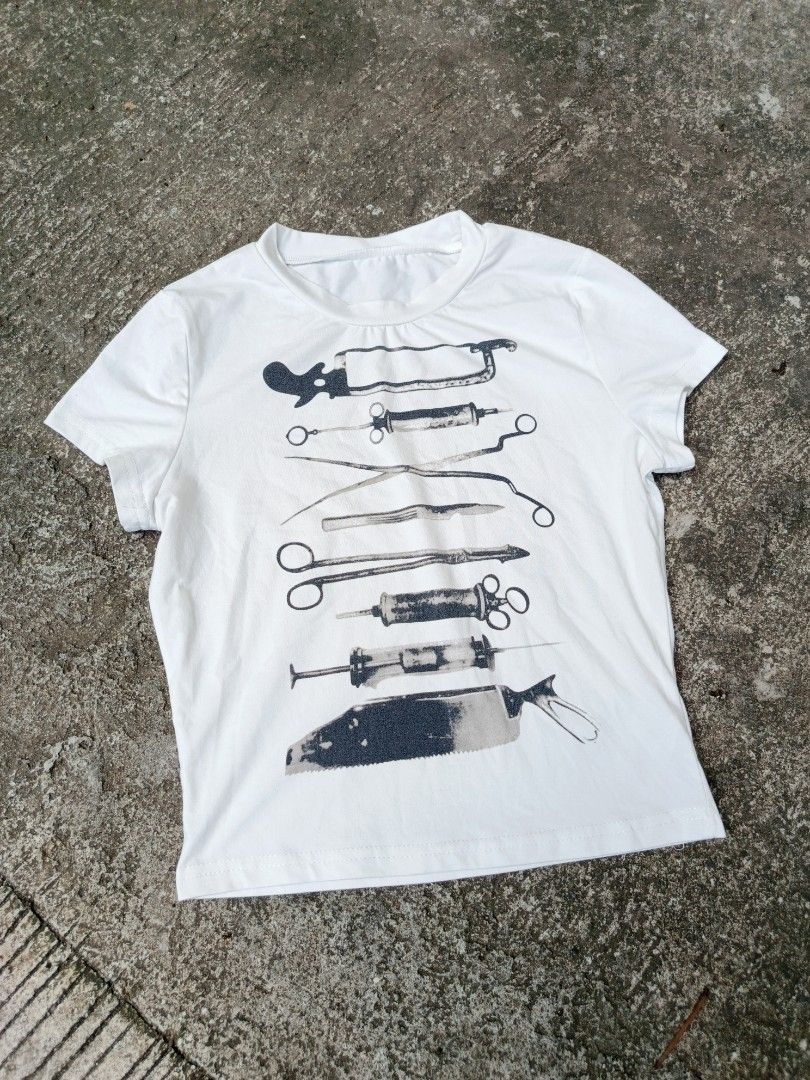 Y2K SURGICAL BABY TEE (Category: Shirts) located in Los Banos. Submitted by kiel_labadan (Listing ID 1464977157, Image 1). Description: ACTUAL DIMES WIDTH 17-18 LENGTH 20 CUT TAGS!.