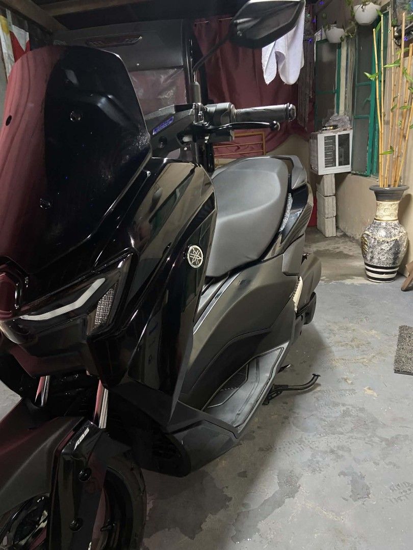 Yamaha Maxi Scooter Black (Category: Skates, Rollerblades & Scooters) located in Santa Cruz, Pampanga. Submitted by jampol102323 (Listing ID 1465117897, Image 1). Description: - Model: Yamaha NMAX 2026 - Color: Glossy Black - Condition: Well-maintained, parked indoors, clean body panels, ready to ride - Features: Bold LED headlights, tinted windscreen, comfortable stepped seat and floorboards - Safety: Front forks with ABS braking system GAS AND 