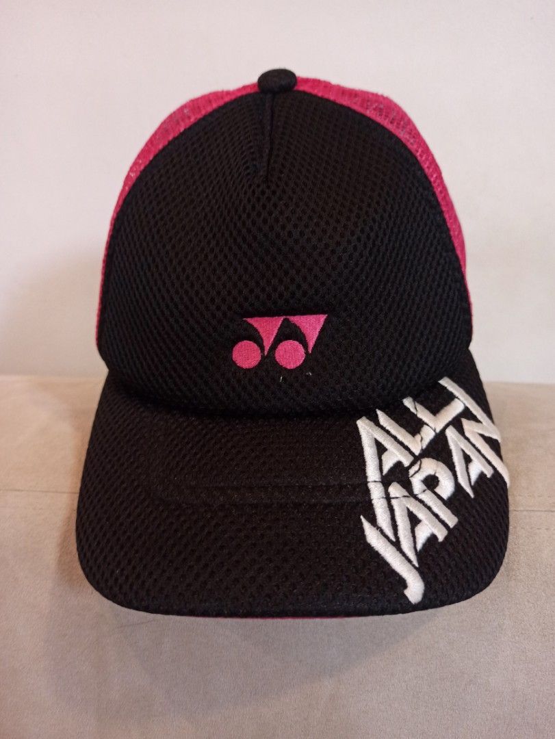 Yonex All Japan Mesh Trucker Hat (Category: Caps & Hats) located in Caloocan City. Submitted by rtarellano (Listing ID 1464994424, Image 1). Description: - Authentic Yonex trucker hat imported from Japan - Black front panel with striking white 'All Japan' lettering and pink Yonex logo - Vibrant pink mesh back for breathability - Adjustable strap closure for a customized fit - Free size (fits most head sizes) - Ideal for badminton players, athlete