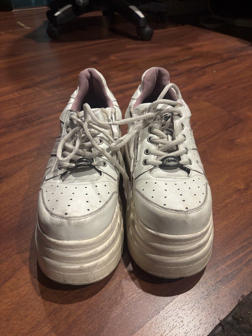 Yosuke Platform White Sneakers Chunky Platform Shoes (Category: Sneakers) located in Quezon City. Submitted by closetskey (Listing ID 1465144751, Image 2). Description: - Brand: Yosuke - Style: Japanese streetwear chunky platform sneakers - Color/Details: White leather upper, pink inner lining, contrast eyelets, and branded lace locks - Sole: Super high, thick chunky sole with textured ridges - Condition: Minor scuffs on the soles and leather upp