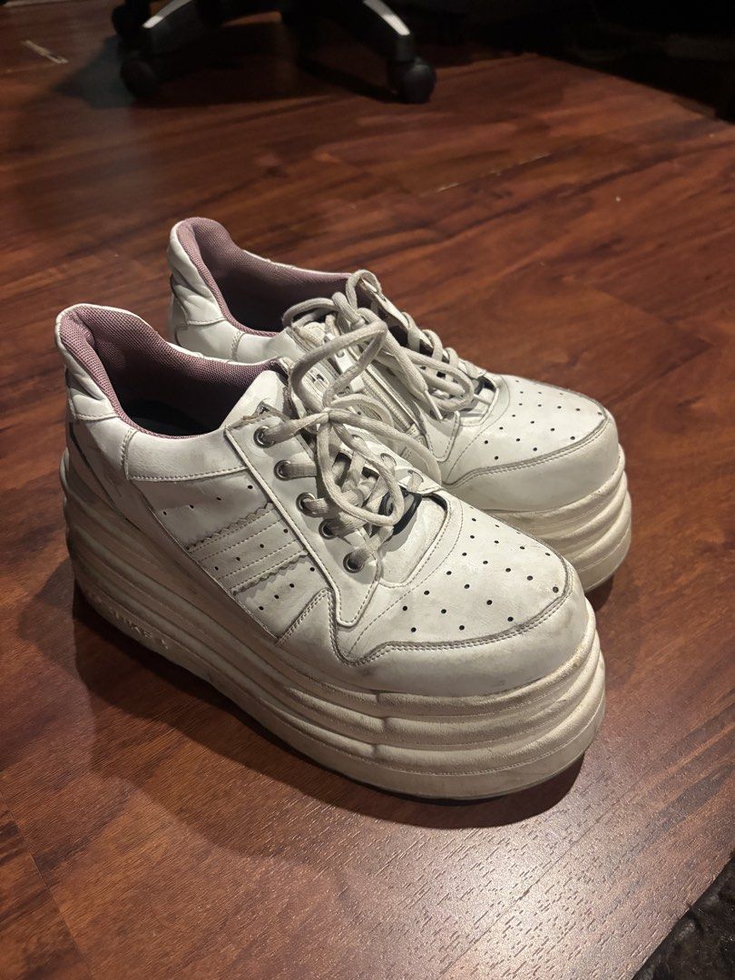 Yosuke Platform White Sneakers Chunky Platform Shoes (Category: Sneakers) located in Quezon City. Submitted by closetskey (Listing ID 1465144751, Image 1). Description: - Brand: Yosuke - Style: Japanese streetwear chunky platform sneakers - Color/Details: White leather upper, pink inner lining, contrast eyelets, and branded lace locks - Sole: Super high, thick chunky sole with textured ridges - Condition: Minor scuffs on the soles and leather upp