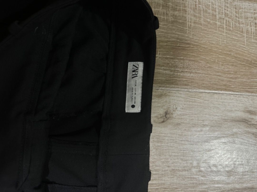 Zara Black Trousers (Category: Jeans) located in Manila. Submitted by tamcloset960 (Listing ID 1465100144, Image 2). Description: - Brand: Zara - Color: Black - Size: M - Fit: Classic cut, structured - Condition: Clean fabric - Best for: Office wear, formal events, and easy pairing with button-downs or blazers.