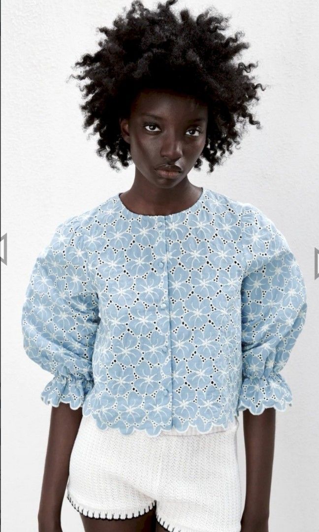 Zara Blue Eyelet Embroidered Button-Up Blouse (Category: Blouses) located in Manila. Submitted by jpsal (Listing ID 1464360208, Image 1). Description: - Zara light blue blouse - never used - Intricate white eyelet embroidery all over (floral pattern) - Button-up front - Scalloped hem and cuffs - Long sleeves with gathered wrist detail - Made in Indonesia.
