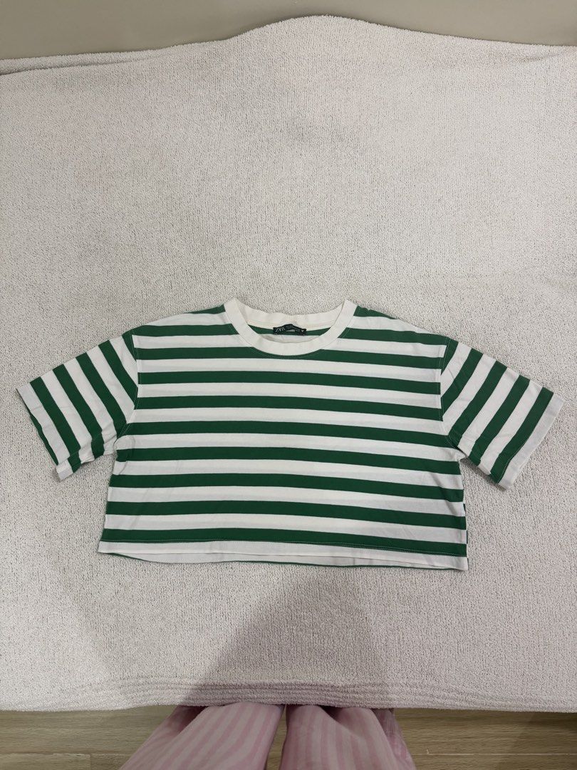 Zara Crop Top M (Category: Shirts) located in Subic. Submitted by kittysclosetsale (Listing ID 1465031335, Image 1). Description: - Brand: Zara - Style: Green & white horizontal stripes, short sleeves, crew neck crop top - Size: M (fits true to size) - Material: Soft, comfortable cotton - Condition: Worn a handful of times, clean and well-maintained - Perfect for: Casual everyday wear, easy to match with high-waisted jeans or shorts.