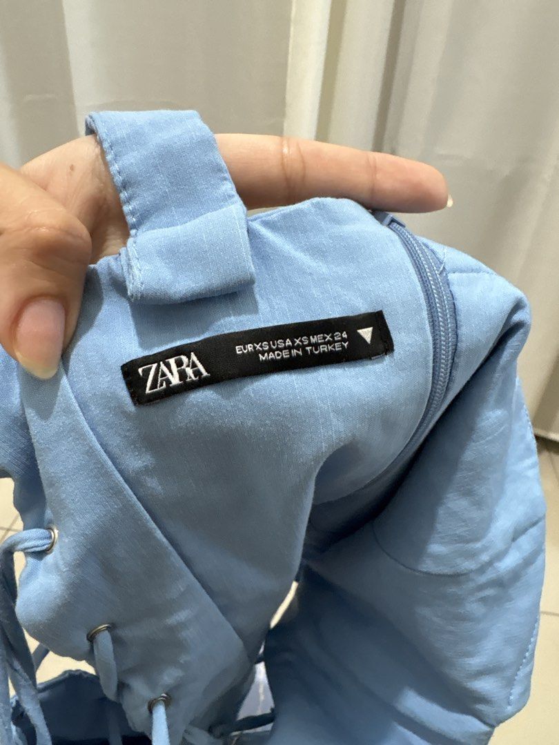 ZARA Light Blue Corset Top XS (Category: Sleeveless) located in Quezon City. Submitted by ch4se (Listing ID 1465018162, Image 3). Description: - used once only - has boning on the front - tie up at the back rfs: does not compliment my skintone.