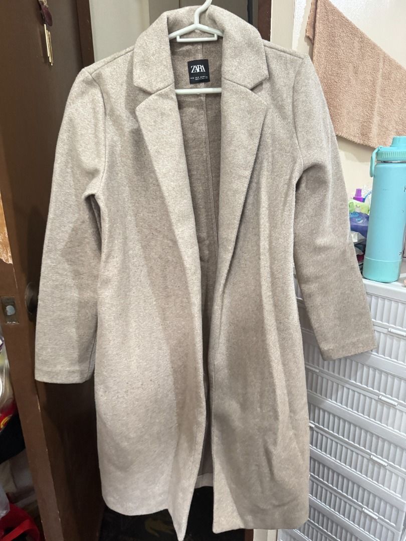 Zara Long Coat (Category: Coats, Jackets and Outerwear) located in Bulacan. Submitted by cheeryfatima (Listing ID 1465037335, Image 1). Description: ZARA Long Coat - Never worn / Brand new - size Small - from Canada - neutral beige/taupe color - perfect for cold weather & travel RFS: Decluttering / not getting to use it. 📩 PM if interested! 😊.